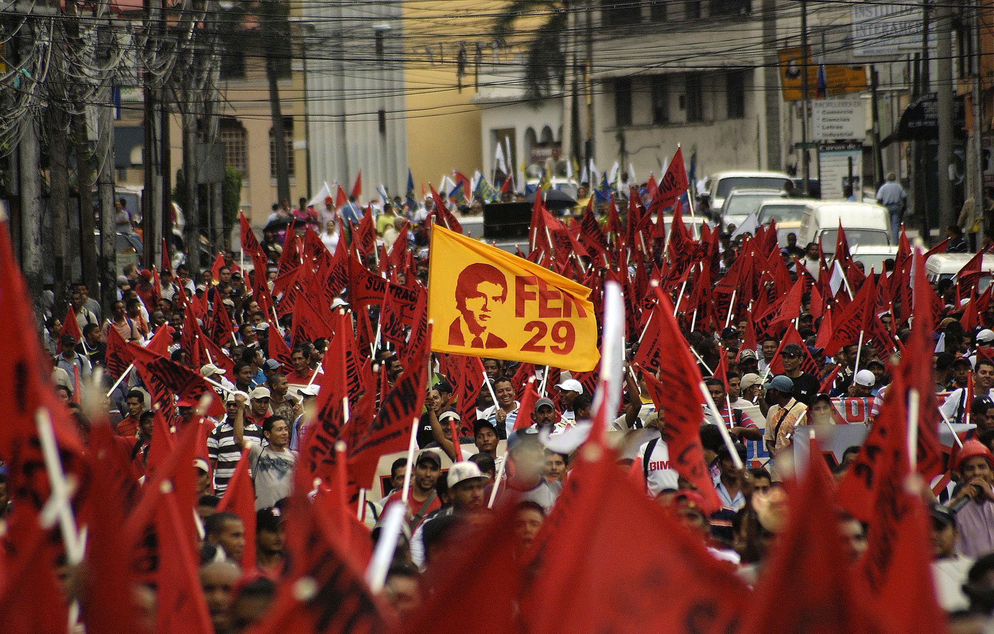 Global May Day Protests 2026 workers marching with banners