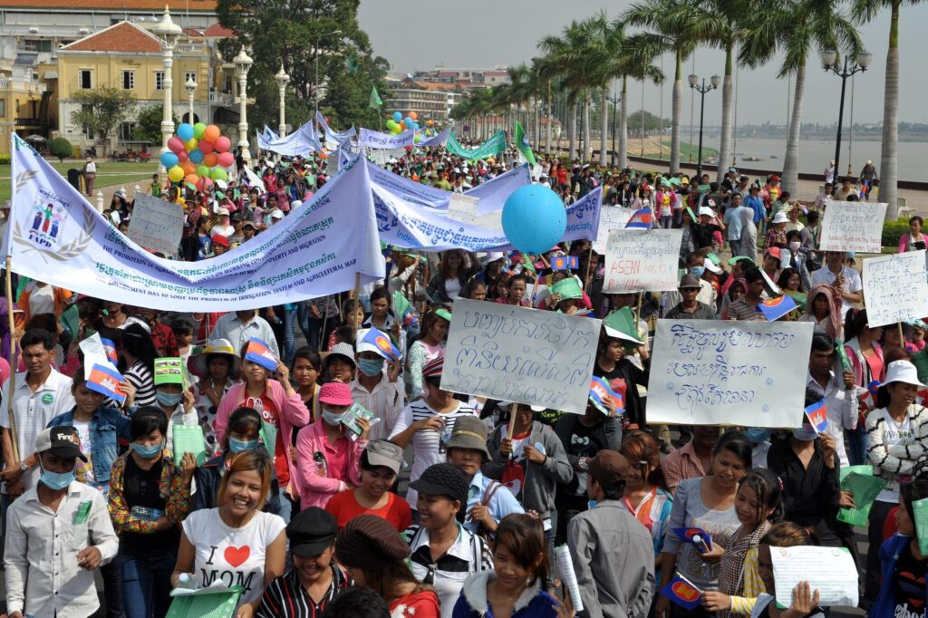 Global May Day Protests 2026 workers marching with banners